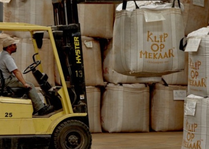 man driving forklift of bulk rooibos tea